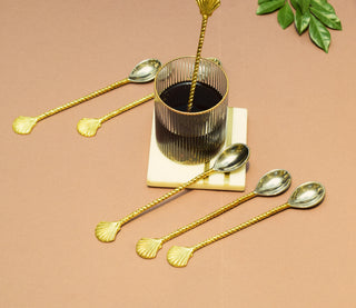 Shell coffee stirrer in gold finish SO6
