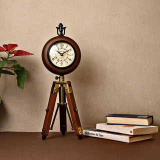 Wooden table clock on a tripod stand