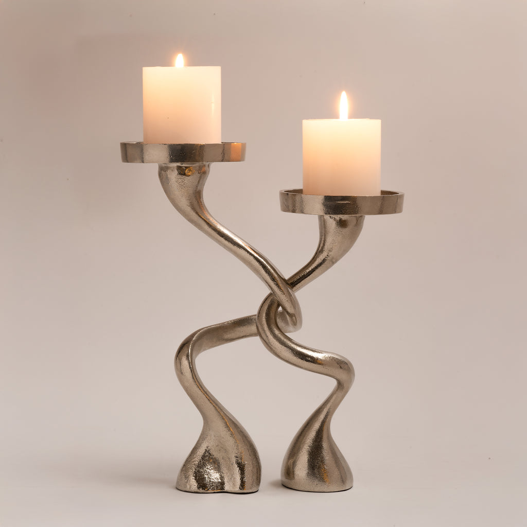 Dancing hugging candle holder