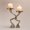 Dancing hugging candle holder