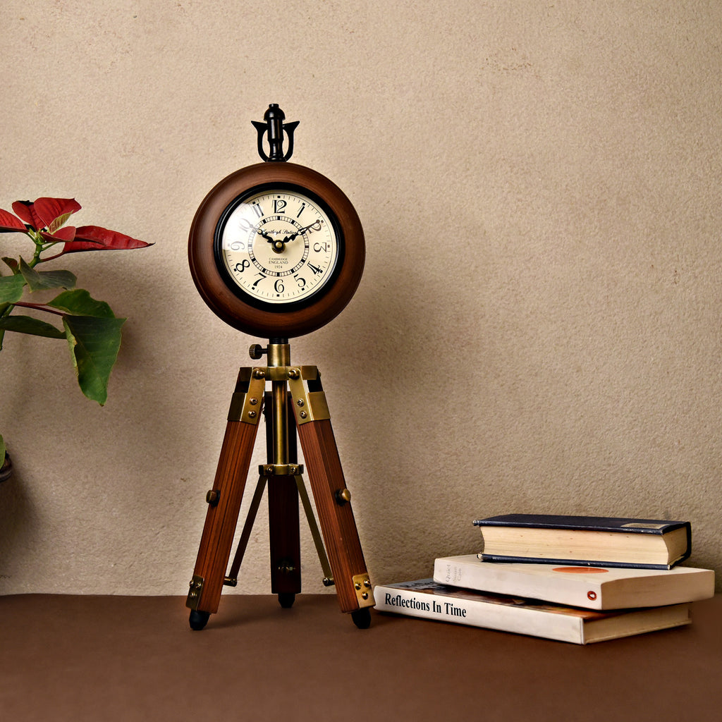 Wooden table clock on a tripod stand