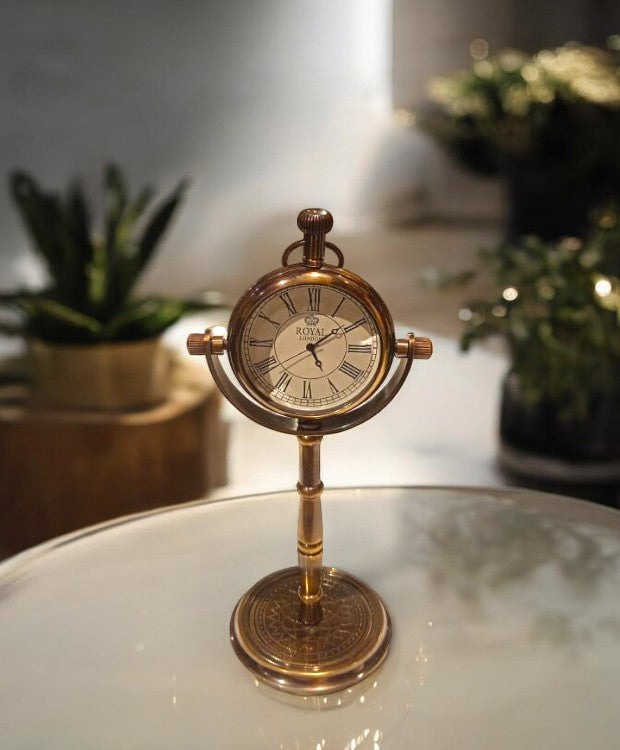 Table clock on stand in brass finish